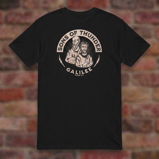 Sons of Thunder T-shirt in Black, overhead flat lay on blurred brick