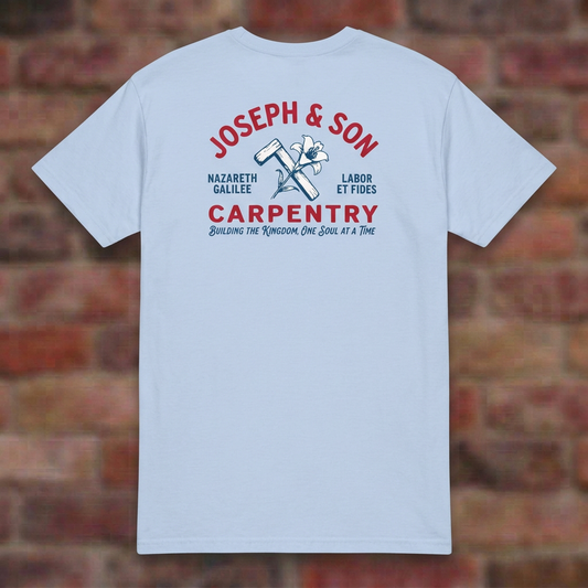 Joseph & Son Carpentry T-shirt in Light Blue, overhead flat lay on softly blurred brick