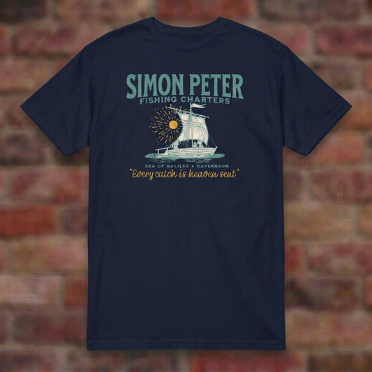Simon Peter Fishing Charters T-shirt in Navy, overhead flat lay on blurred brick