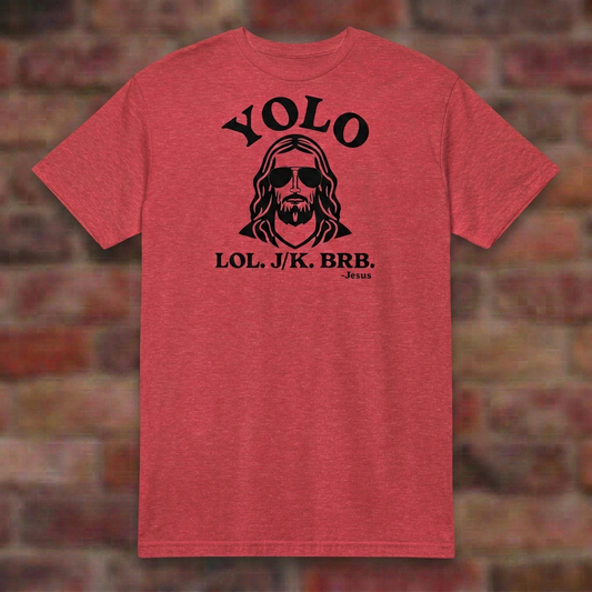 YOLO T-shirt in Heather Red, color-corrected overhead flat lay on blurred brick