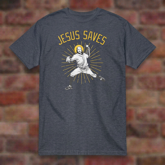 Jesus Saves Baseball T-shirt in Heather Navy, overhead flat lay on blurred brick