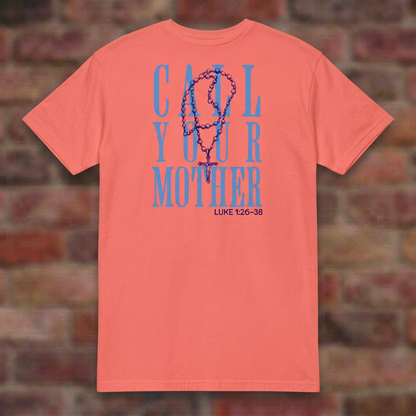 Call Your Mother T-shirt in Coral Silk, flat lay on blurred brick